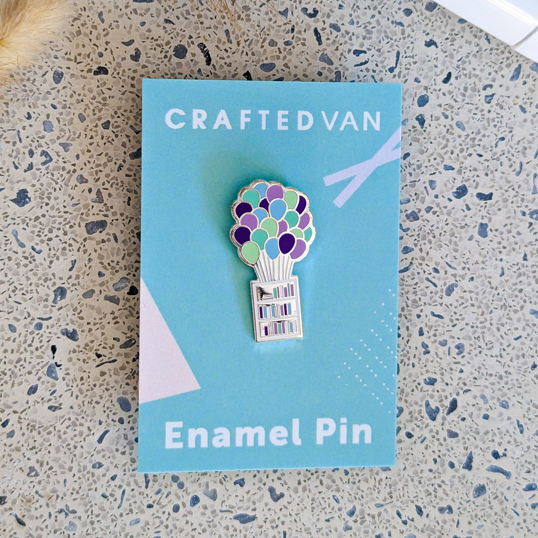 Balloons and Bookshelf Enamel Pin