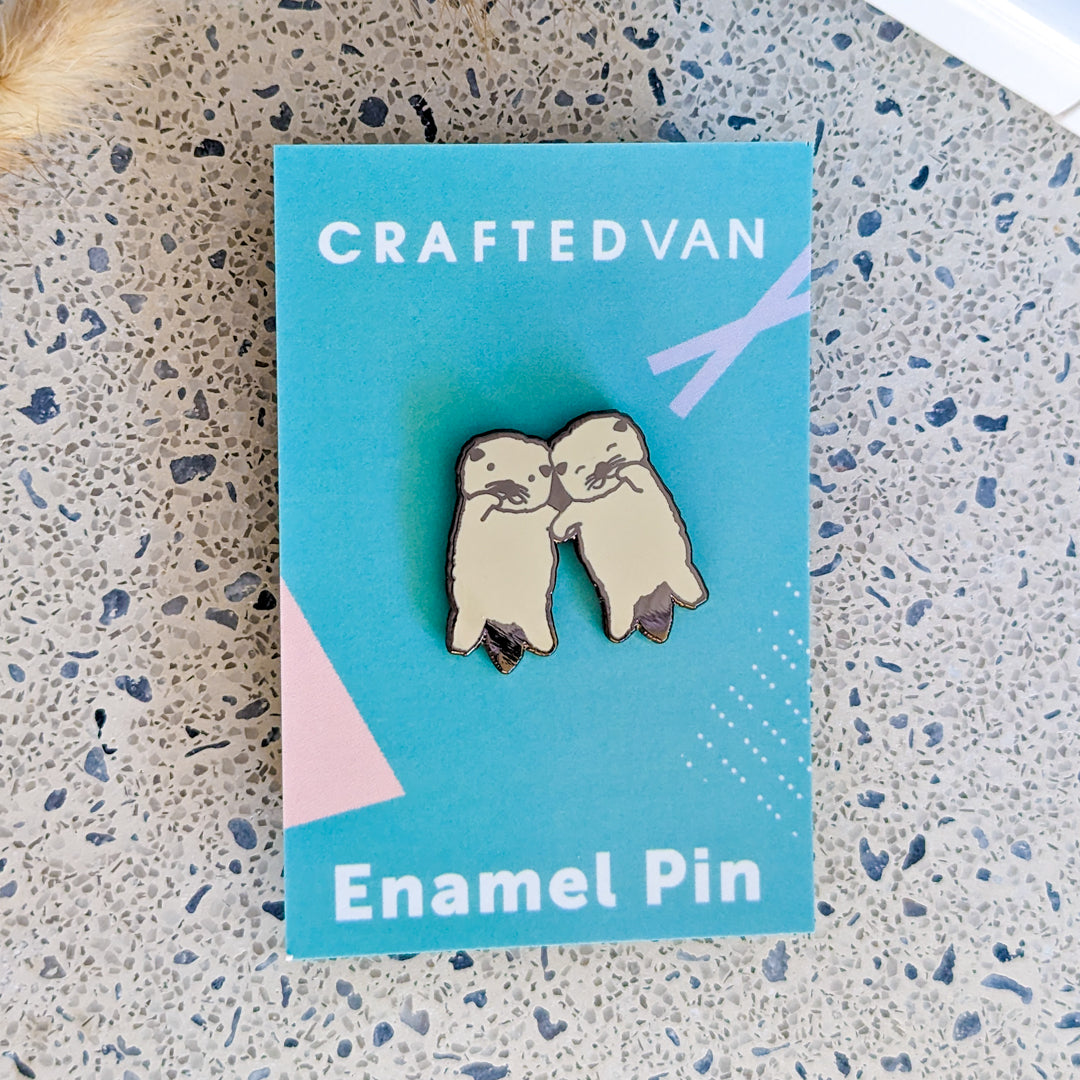 Otters Holding Hands Enamel Pin