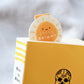 Shine Bright Sunshine Magnetic Bookmark by Craftedvan, tucked inside a book.