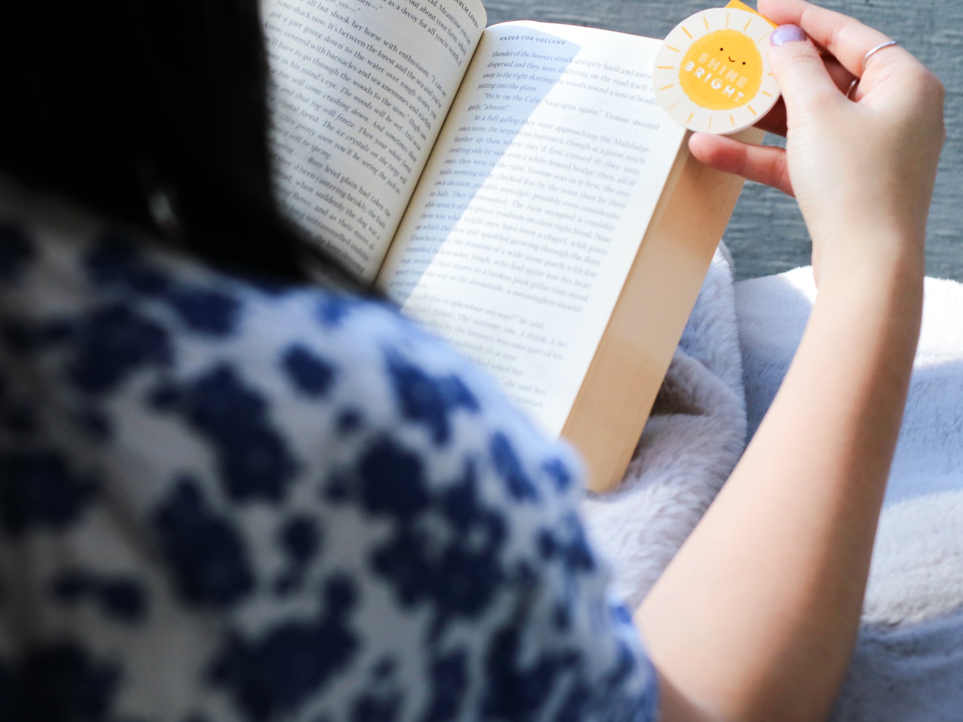 Shine Bright Sunshine Magnetic Bookmark by Craftedvan, being used by a reader.